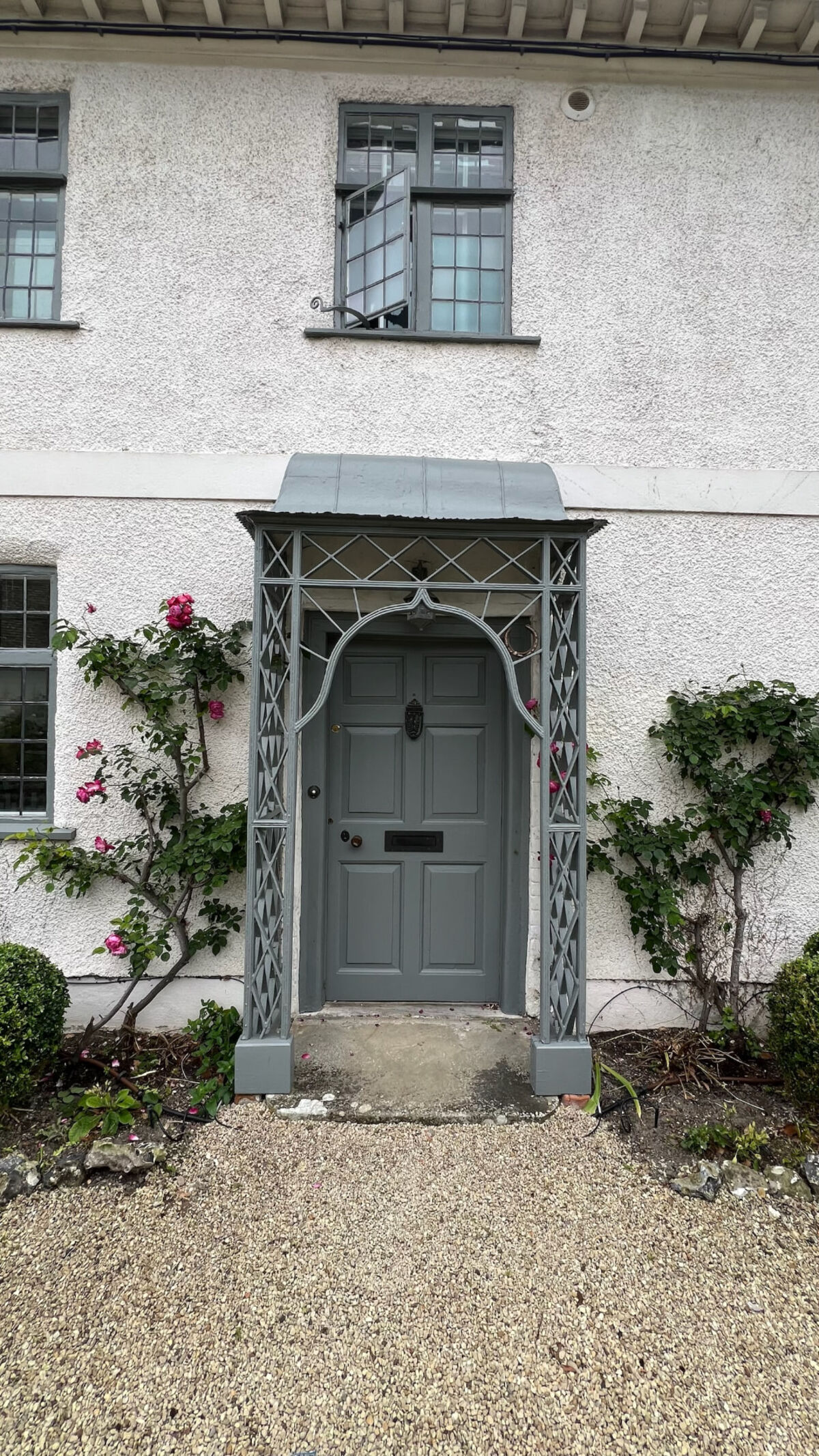The front door and grey porch of the client's new home in Oxfordshire